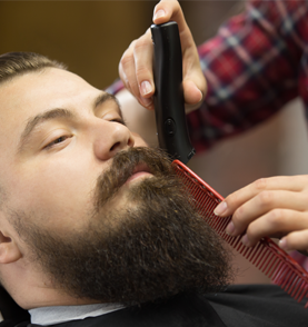 Barber demonstrating technique